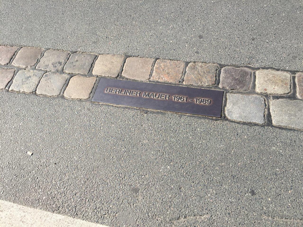 John F Kennedy and Ronald Reagan historical markers about the Berlin Wall