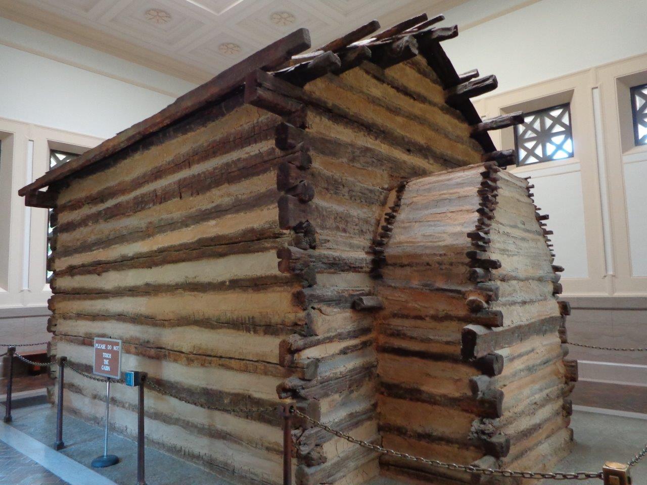 photo of replica Abraham Lincoln birthplace log cabin