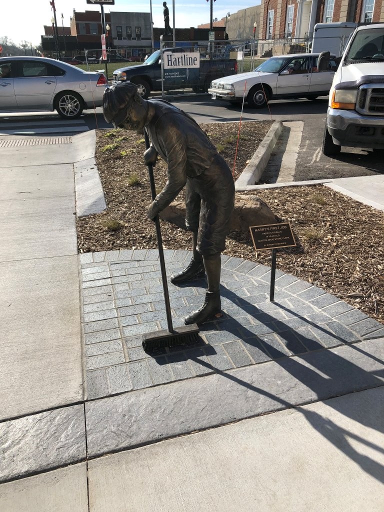 Harry Truman first job at Clinton's soda fountain statue in Independence, Missouri